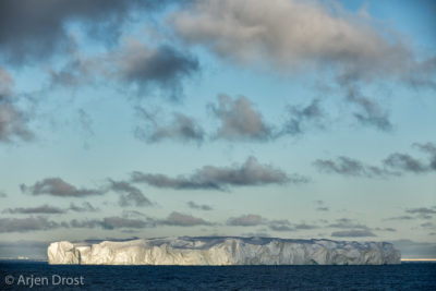 A tabular iceberg in evening light in the Ross Sea
