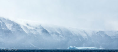 Mountains appear from the fog at Cape Hallett, Ross Sea